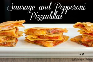 I can't wait to make these for my Super Bowl Party! Sausage and Pepperoni Pizzadillas