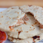 These look yummy and I'm so excited they're gluten-free! Salvadorean Pupusas are pillowy bean and cheese-stuffed corn tortillas.
