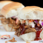 These sliders look awesome!! Slow Cooker Pulled Pork Sliders.