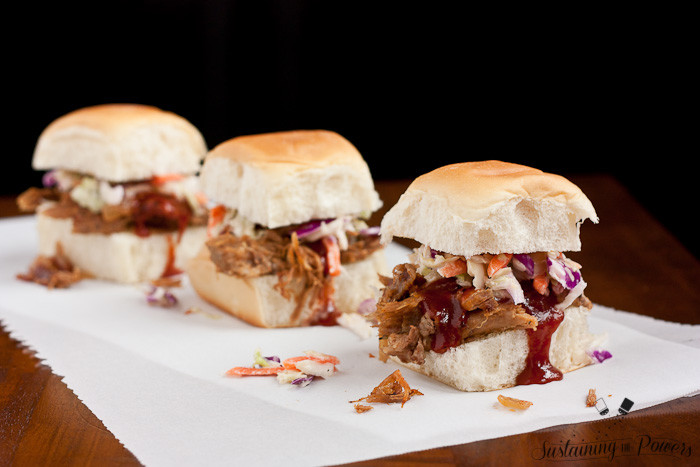 These sliders look awesome!! Slow Cooker Pulled Pork Sliders.