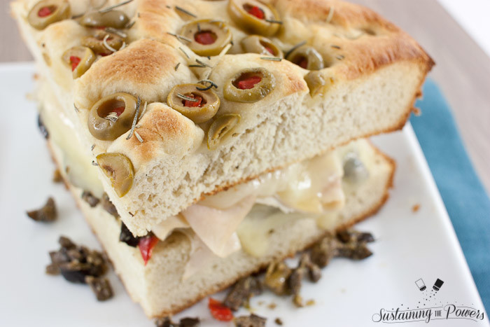 Turkey muffulettas should be the national sandwich. I can't get enough! This simplified recipe for a turkey muffuletta combines olive focaccia, turkey, provolone, and olive salad in a toasted sandwich. 