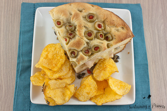 Turkey muffulettas should be the national sandwich. I can't get enough! This simplified recipe for a turkey muffuletta combines olive focaccia, turkey, provolone, and olive salad in a toasted sandwich. 