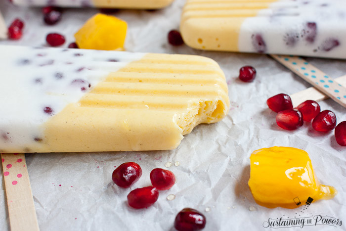 These popsicles taste like a pomegranate pina colada and a mango lassi had a baby and stuck it in the freezer. Yum!