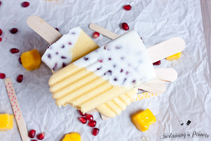 These popsicles taste like a pomegranate pina colada and a mango lassi had a baby and stuck it in the freezer. Yum!
