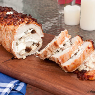 Bacon Marinated Pork Loin Stuffed with Fig Sage and Goat Cheese - This is one of my favorite recipes for entertaining because it looks super fancy, but doesn't take much effort!