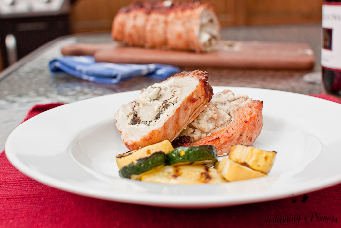 Bacon Marinated Pork Loin Stuffed with Fig Sage and Goat Cheese - This is one of my favorite recipes for entertaining because it looks super fancy, but doesn't take much effort! 
