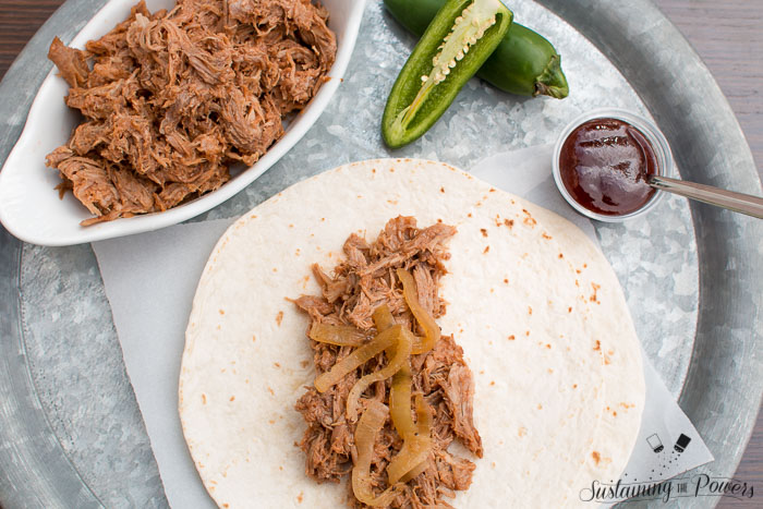 Slow Cooker Sweet and Spicy Pulled Pork made with Dr. Pepper! This was a huge hit with my family! 