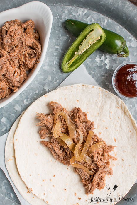 Slow Cooker Sweet and Spicy Pulled Pork made with Dr. Pepper! This was a huge hit with my family! 