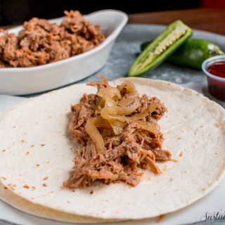 Slow Cooker Sweet and Spicy Pulled Pork made with Dr. Pepper! This was a huge hit with my family!
