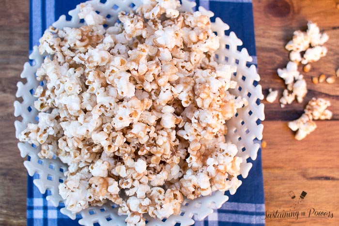 This popcorn is coated in a toffee that's made in the microwave! You don't need a candy thermometer or any extra baking!