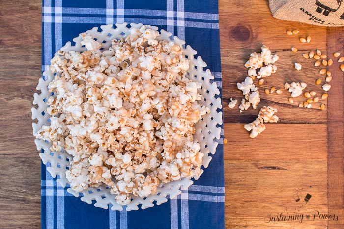 This popcorn is coated in a toffee that's made in the microwave! You don't need a candy thermometer or any extra baking! Such a hit at our party.