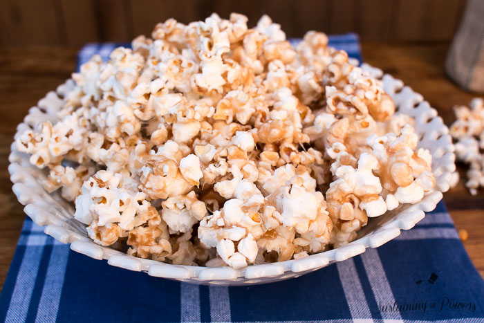 This popcorn is coated in a toffee that's made in the microwave! You don't need a candy thermometer or any extra baking! Such a hit at our party.