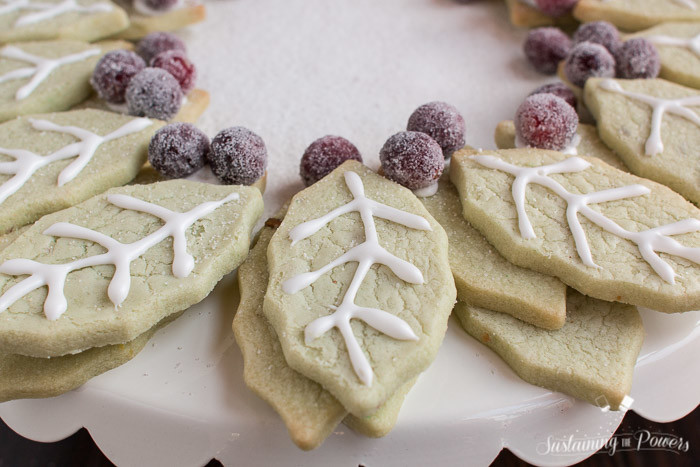 This looks amazing! And I never would have thought to use pistachio pudding mix in my sugar cookies. Brilliant! Pistachio Sugar Cookie Wreath with Sugared Cranberries
