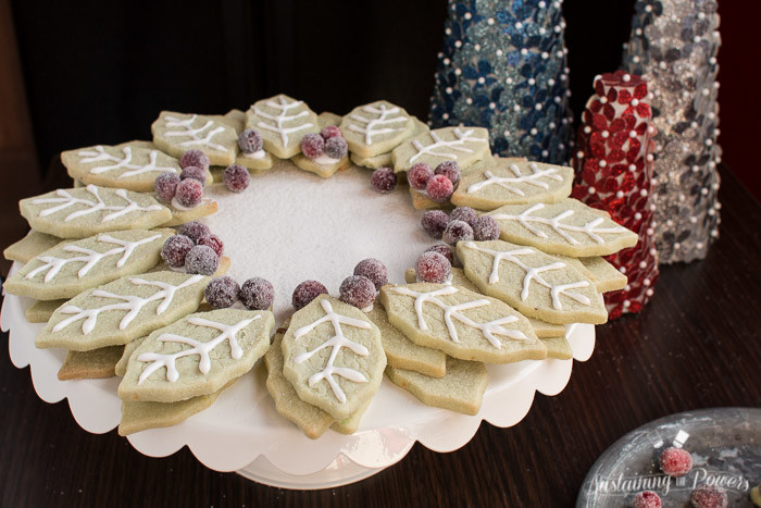 This looks amazing! And I never would have thought to use pistachio pudding mix in my sugar cookies. Brilliant! Pistachio Sugar Cookie Wreath with Sugared Cranberries