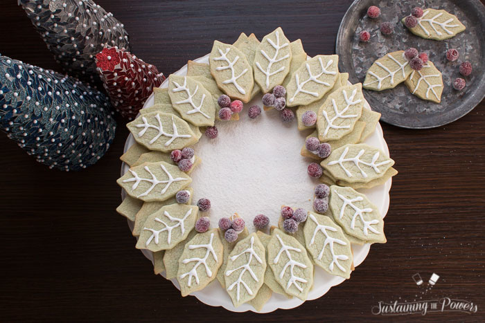 This looks amazing! And I never would have thought to use pistachio pudding mix in my sugar cookies. Brilliant! Pistachio Sugar Cookie Wreath with Sugared Cranberries