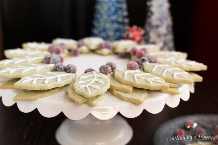 This looks amazing! And I never would have thought to use pistachio pudding mix in my sugar cookies. Brilliant! Pistachio Sugar Cookie Wreath with Sugared Cranberries