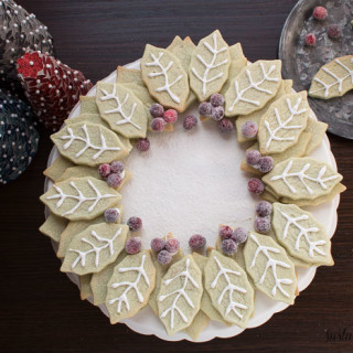 This looks amazing! And I never would have thought to use pistachio pudding mix in my sugar cookies. Brilliant! Pistachio Sugar Cookie Wreath with Sugared Cranberries