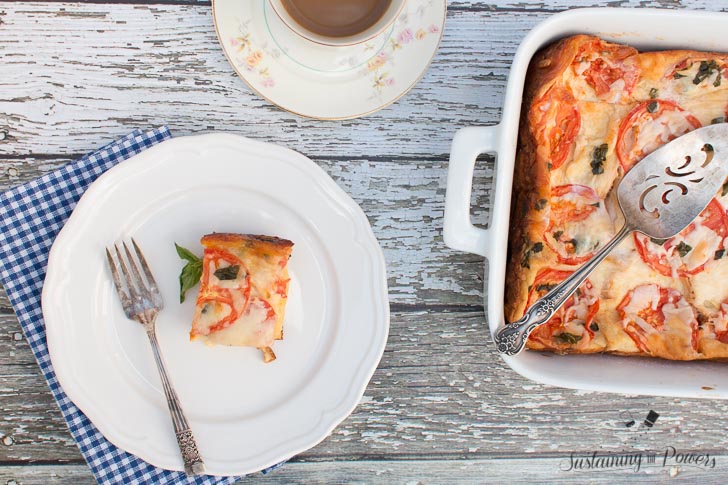 This Tomato, Basil, and Mozzarella Layered Egg Bake (Strata) is a cross between a fritatta and a bread pudding. Super cheap and you'll definitely impress your guests!