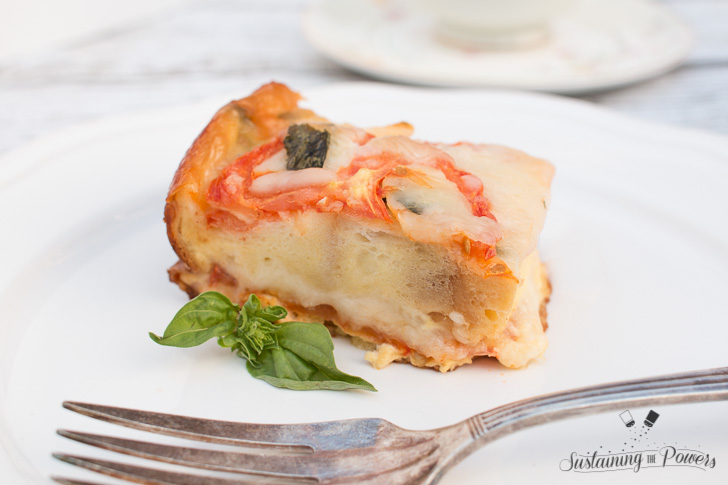 This Tomato, Basil, and Mozzarella Layered Egg Bake (Strata) is a cross between a fritatta and a bread pudding. Super cheap and you'll definitely impress your guests!