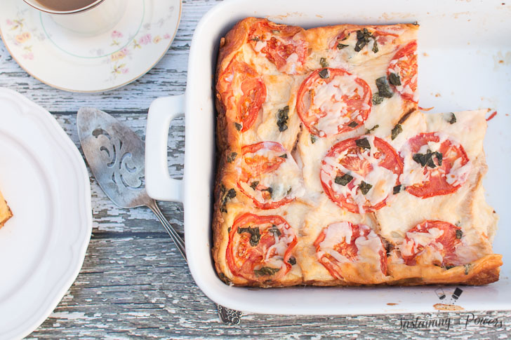 This Tomato, Basil, and Mozzarella Layered Egg Bake (Strata) is a cross between a fritatta and a bread pudding. Super cheap and you'll definitely impress your guests!