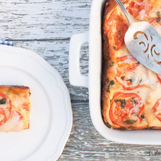 This Tomato, Basil, and Mozzarella Layered Egg Bake (Strata) is a cross between a fritatta and a bread pudding. Super cheap and you'll definitely impress your guests!