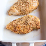 30 Minute Baked Italian Chicken - chicken, italian dressing mix, garlic powder, parmesan cheese, flour, and an egg are all you need! Our favorite weeknight meal.