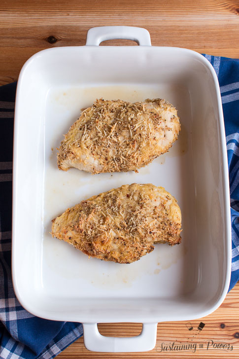 30 Minute Baked Italian Chicken - chicken, italian dressing mix, garlic powder, parmesan cheese, flour, and an egg are all you need! Our favorite weeknight meal.