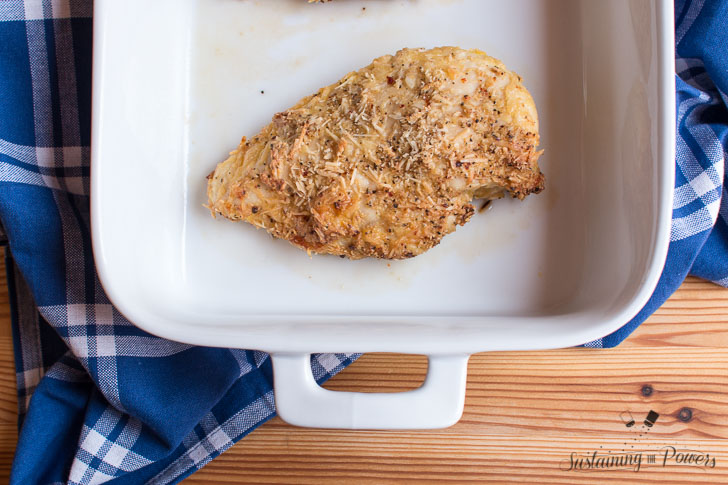 30 Minute Baked Italian Chicken - chicken, italian dressing mix, garlic powder, parmesan cheese, flour, and an egg are all you need! Our favorite weeknight meal.