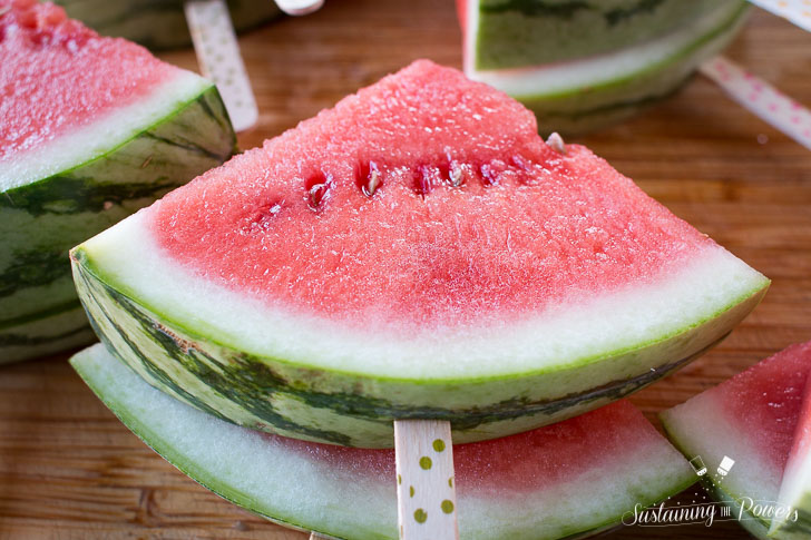 How to Make Chili Lime Watermelon Pops | These are seriously my favorite afternoon snack. You've got so many flavor profiles going on - sweet, salty, spicy, sour, and juicy watermelon. Plus it only takes about 5 minutes to put a whole pretty tray of these watermelon pops together! Click through to grab the recipe!