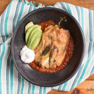 How to Make Low-Carb Chile Rellenos | Chile Rellenos are the Traditional Mexican stuffed pepper. These are filled with meunster cheese and shredded beef. Quick to make and naturally gluten-free, these keto-friendly stuffed poblanos are sure to be a hit! Click through to get the recipe!