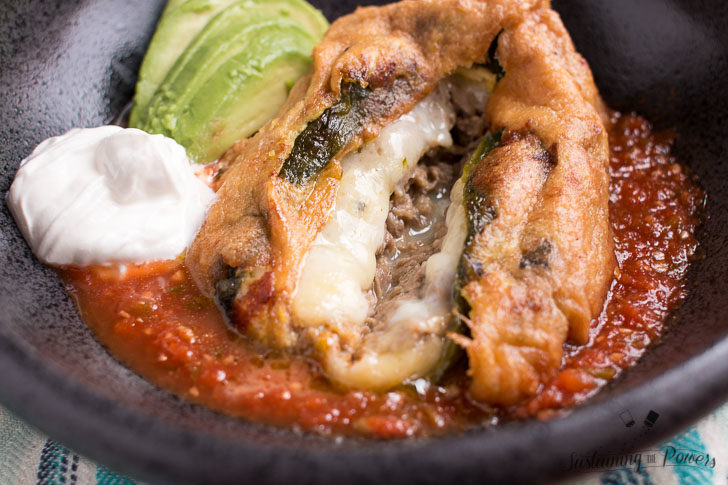 How to Make Low-Carb Chile Rellenos | Chile Rellenos are the Traditional Mexican stuffed pepper. These are filled with meunster cheese and shredded beef. Quick to make and naturally gluten-free, these keto-friendly stuffed poblanos are sure to be a hit! Click through to get the recipe! 