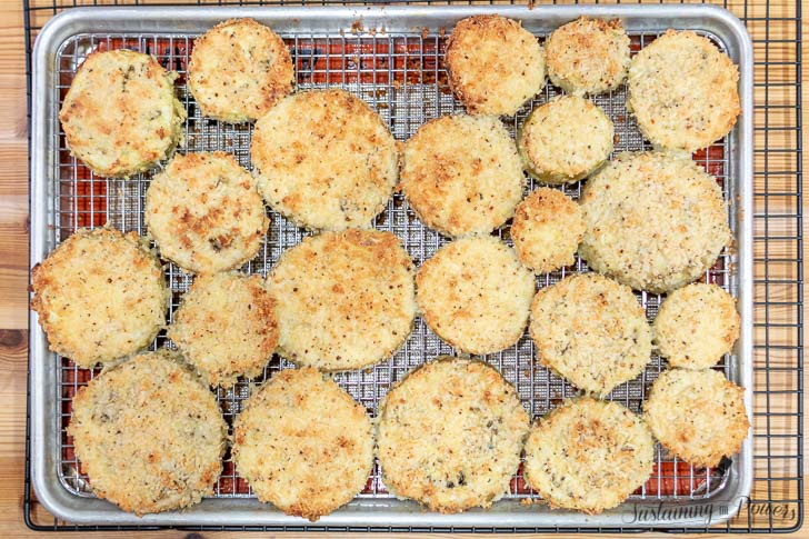 A baking tray of low-carb eggplant parmesan after cooking.